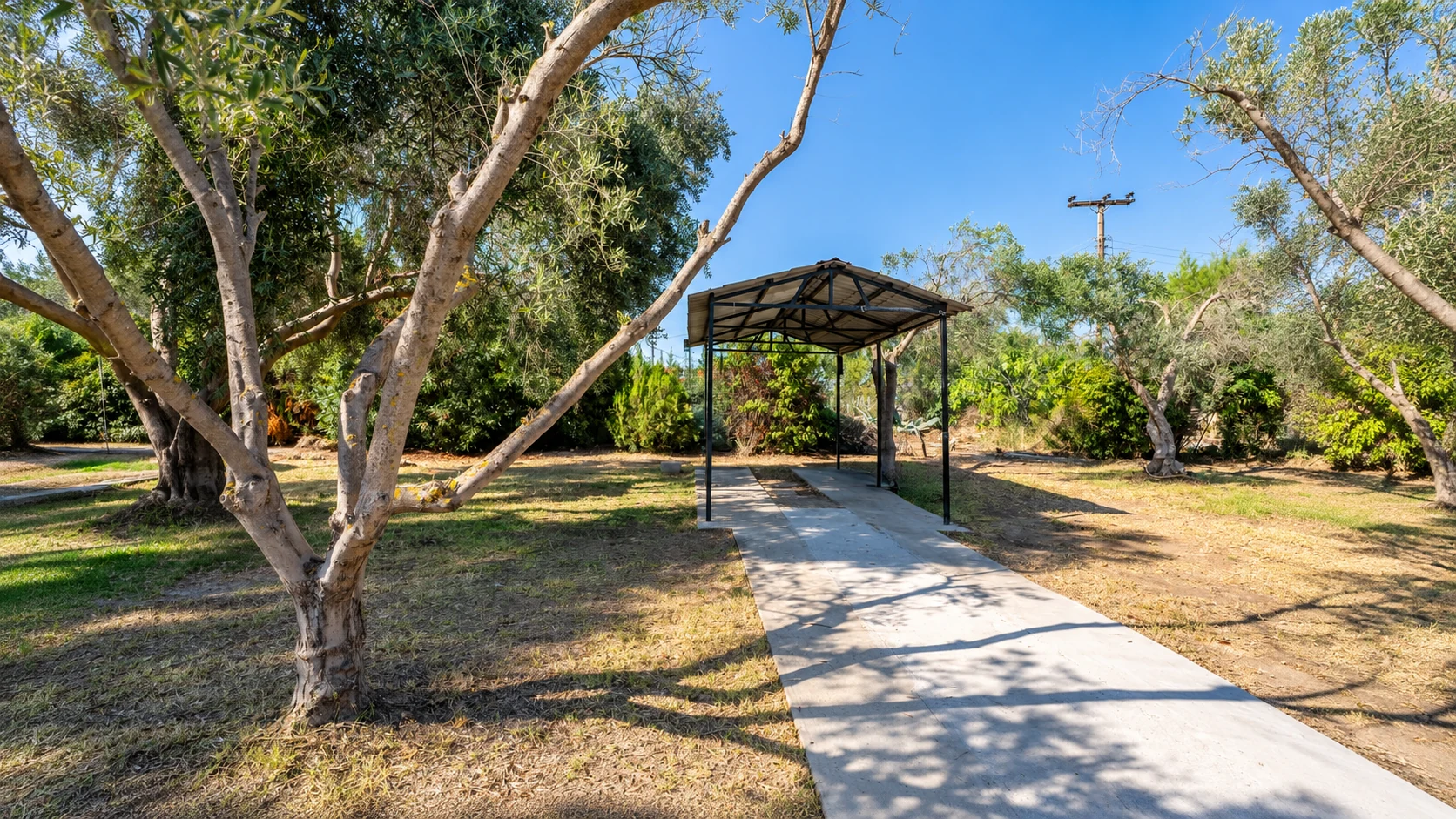Almira Blue shaded carport